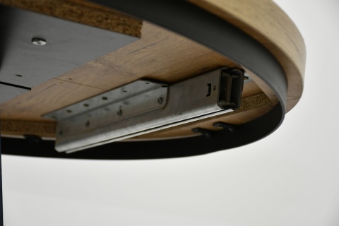 Okrągły, rozkładany stół Lamel Fit z maskownicą