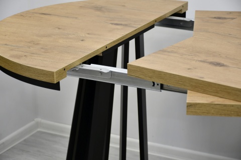 Okrągły, rozkładany stół Lamel Fit z maskownicą