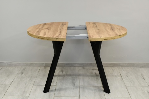 Efektowny, okrągły stół do salonu Jaga fi 100 do 200 cm, blat dab wotan / nogi czarne